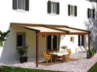 PERGOLE IN LEGNO ADDOSSATE